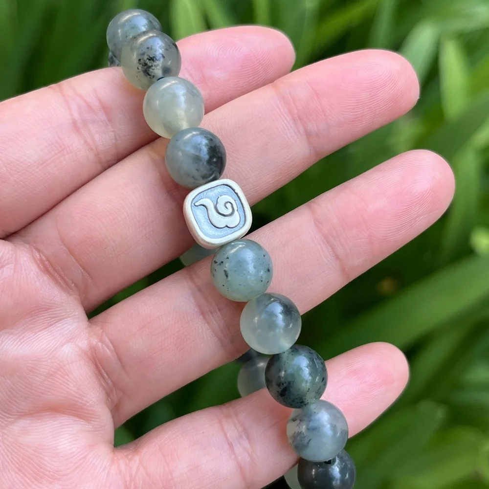10mm stretchable Xiuyan jade with silver accent‎